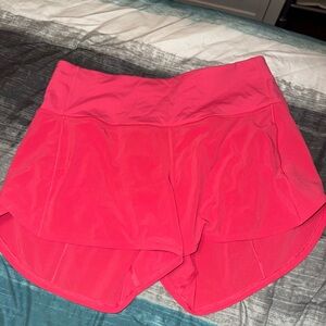 Lululemon Athletica. Speed up high rise 4in inseam. Lip gloss